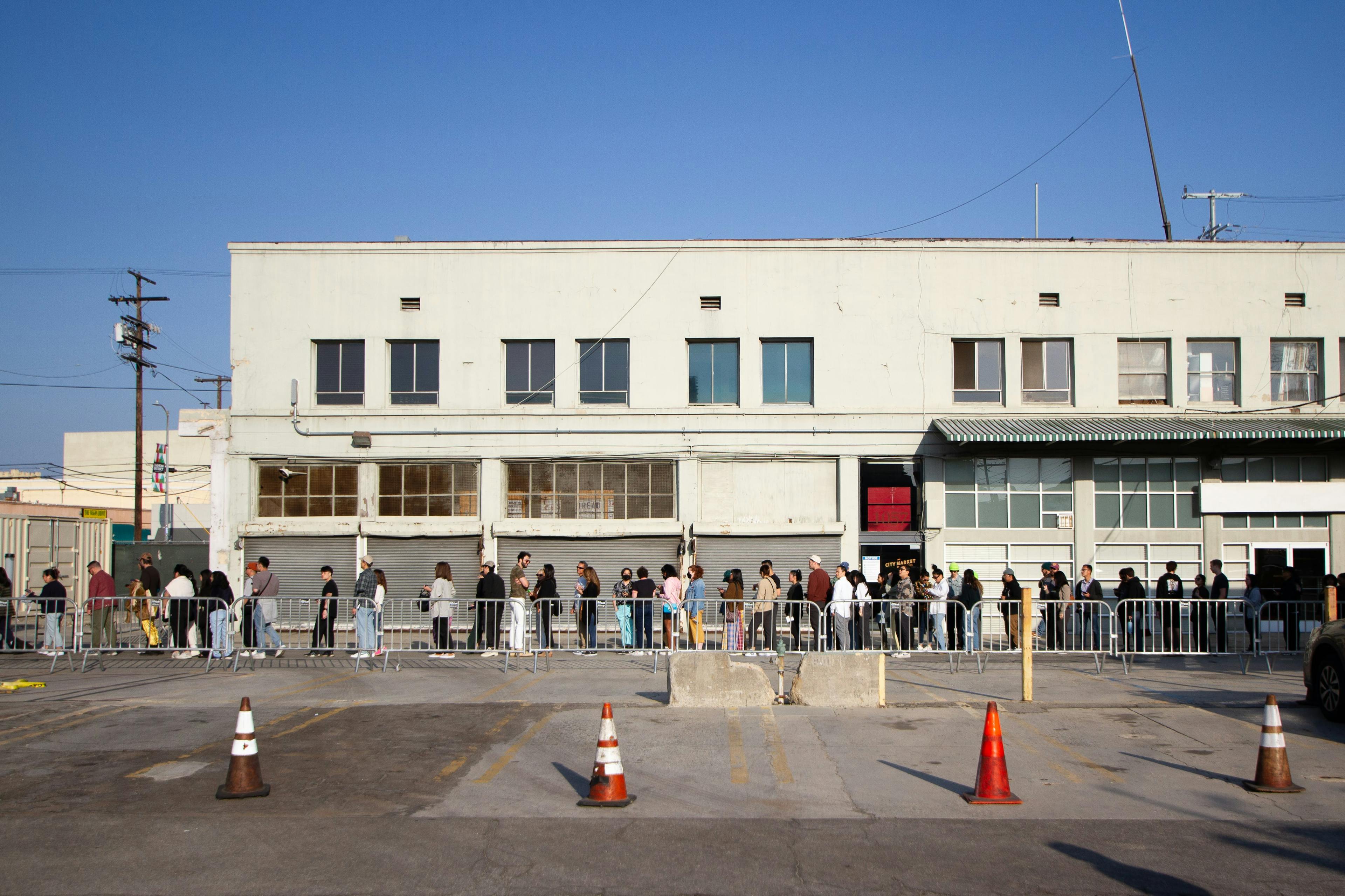 Long line of people waiting to get into a restaurant event