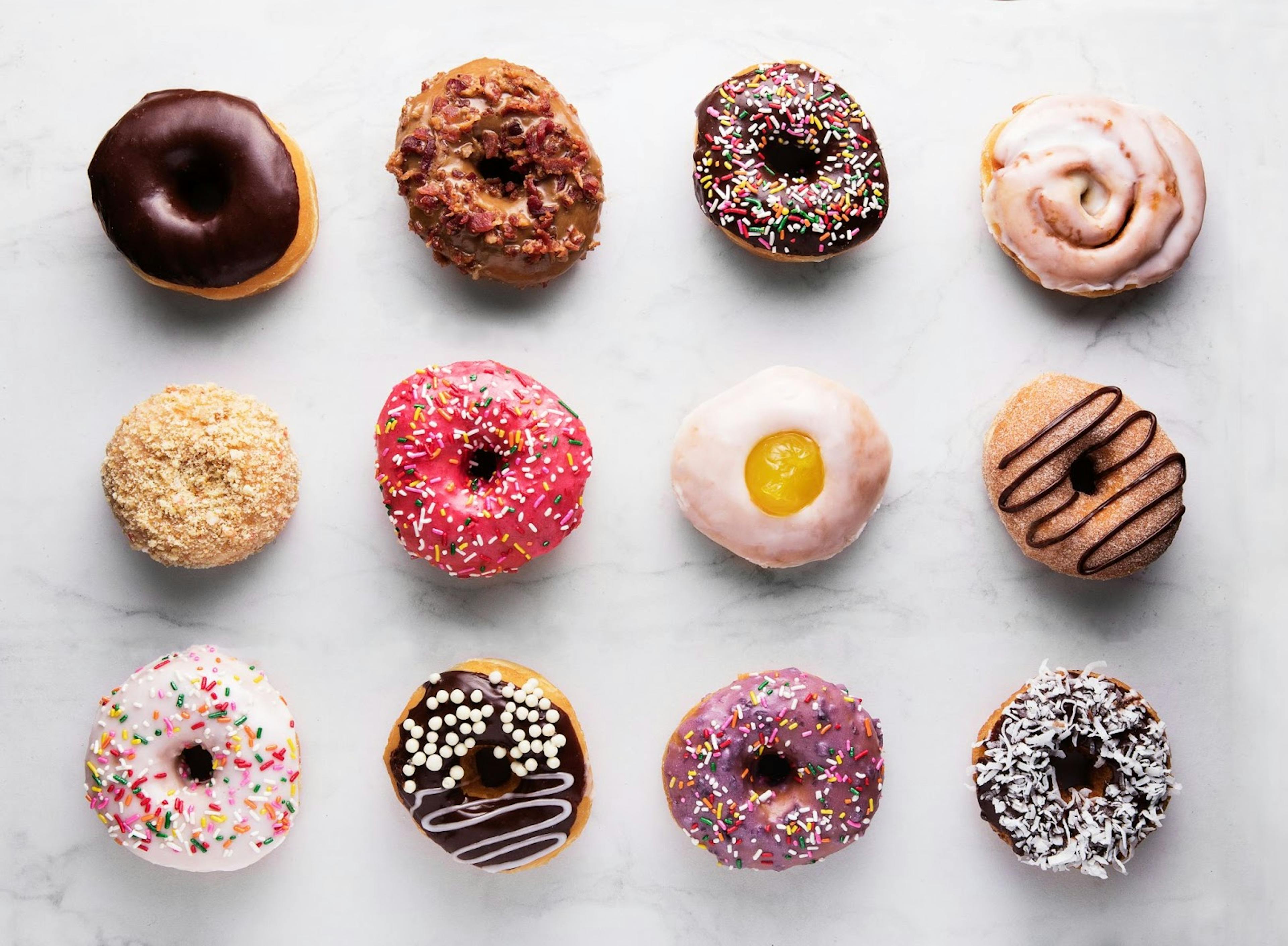 Image of 12 assorted donuts from Primo's Donuts