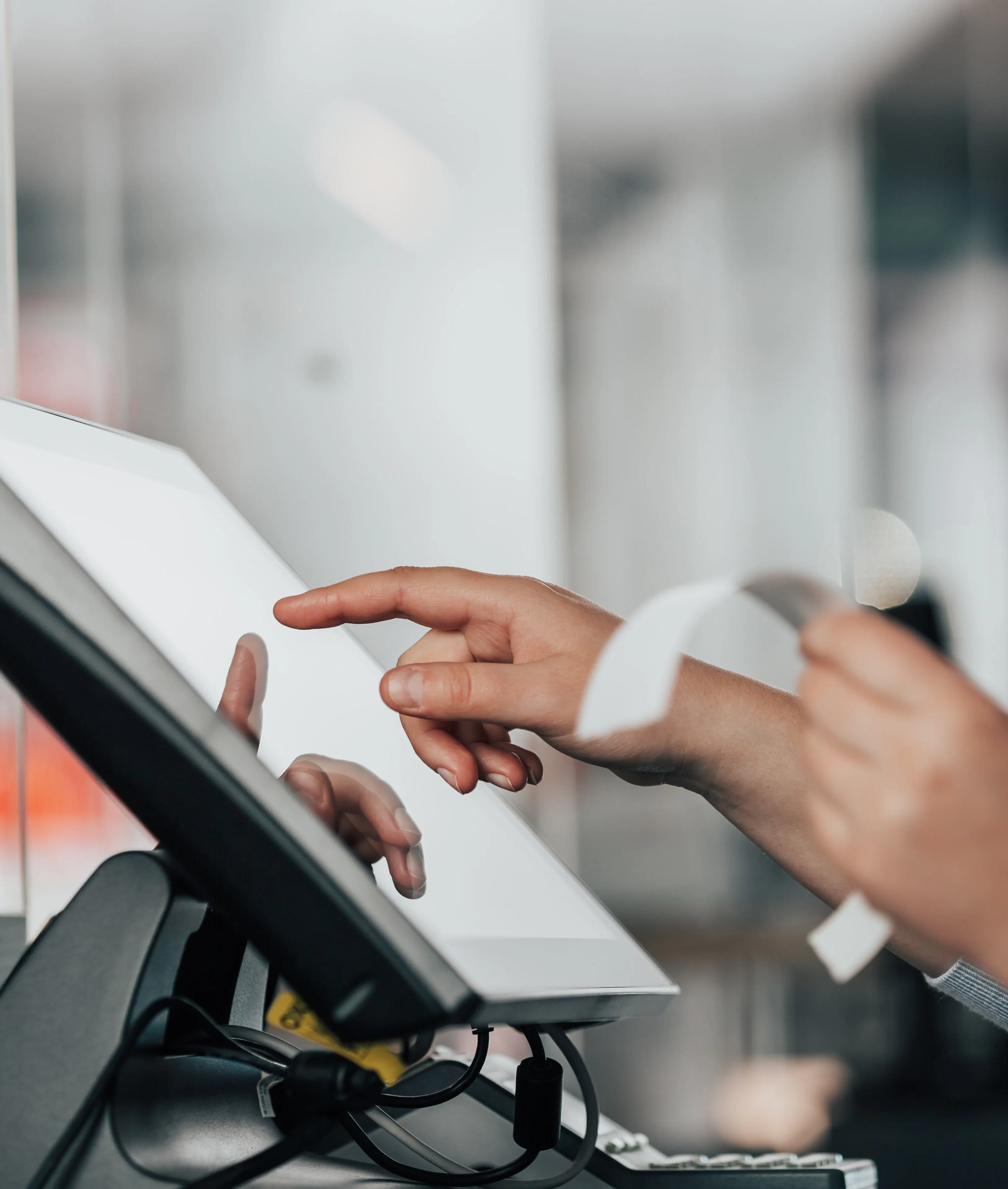 A restaurant owner using a POS system. 