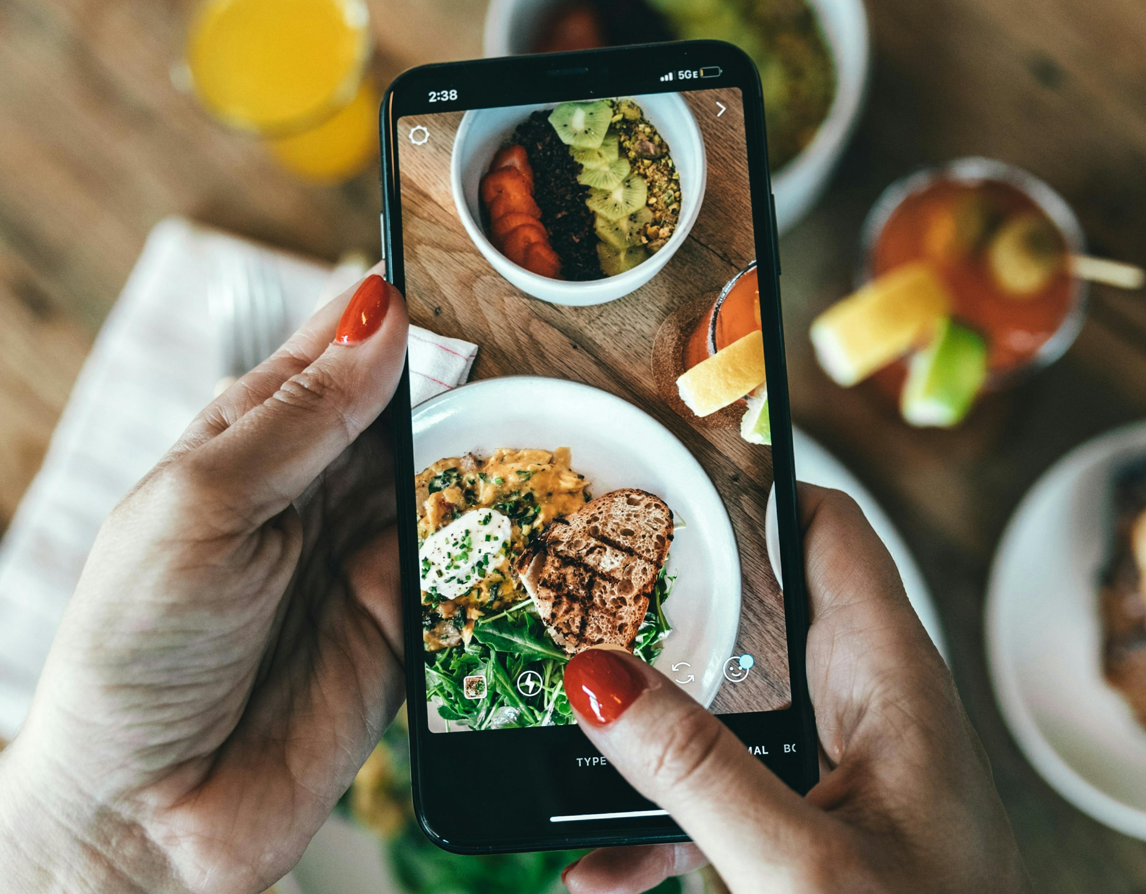 A short video being taken at a restaurant of some food. 