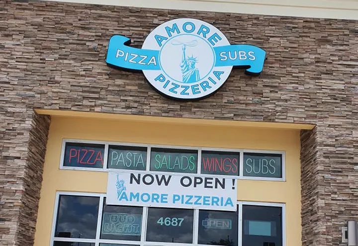 The exterior of Amore Pizzeria's restaurant.