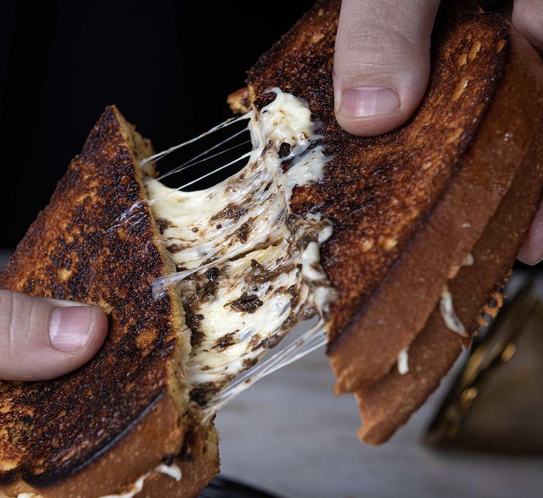 Image of a truffle grilled cheese sandwich from Casina Montreal