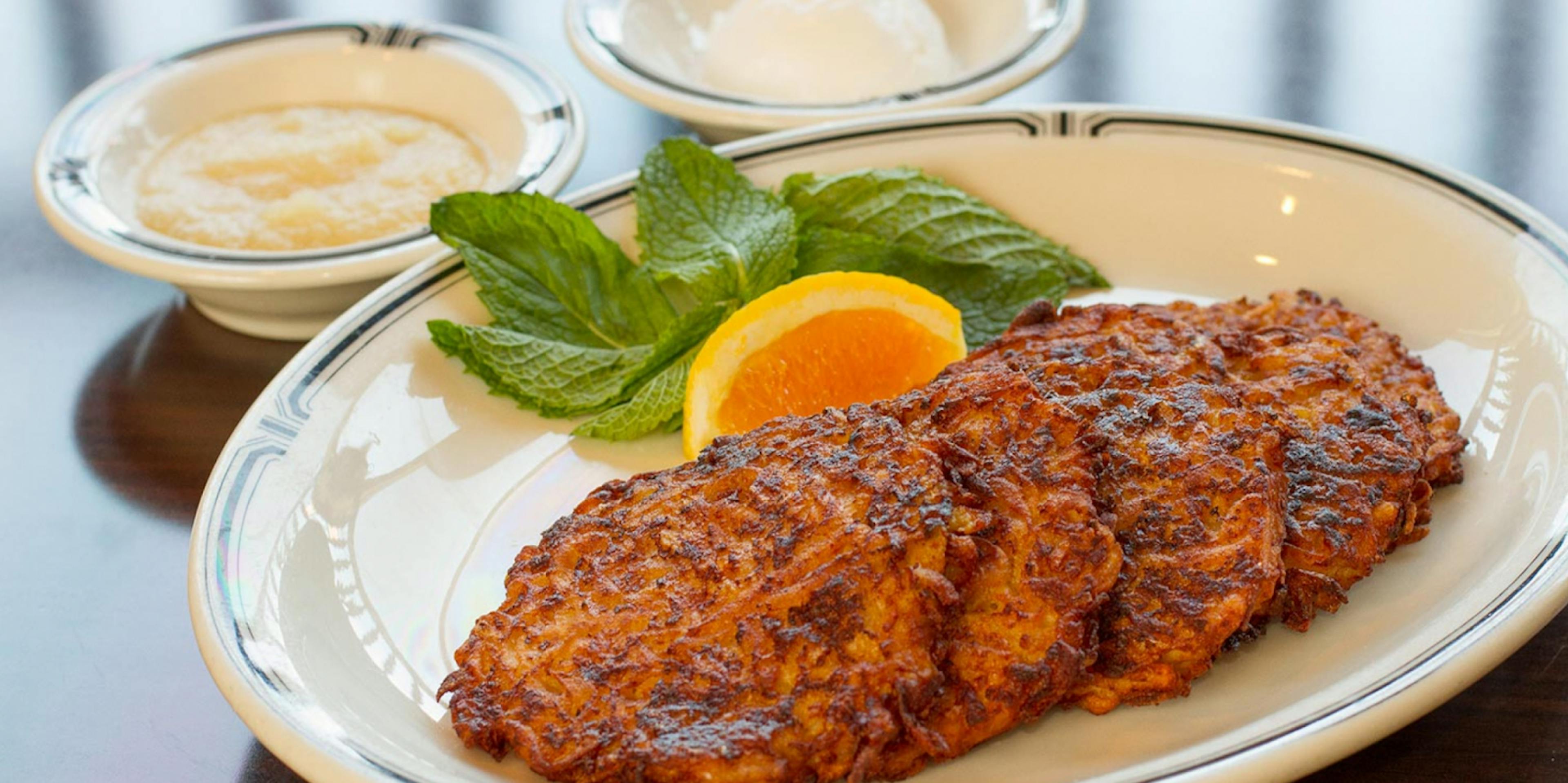 Image of a plate of Latkes, traditional Jewish-American holiday food