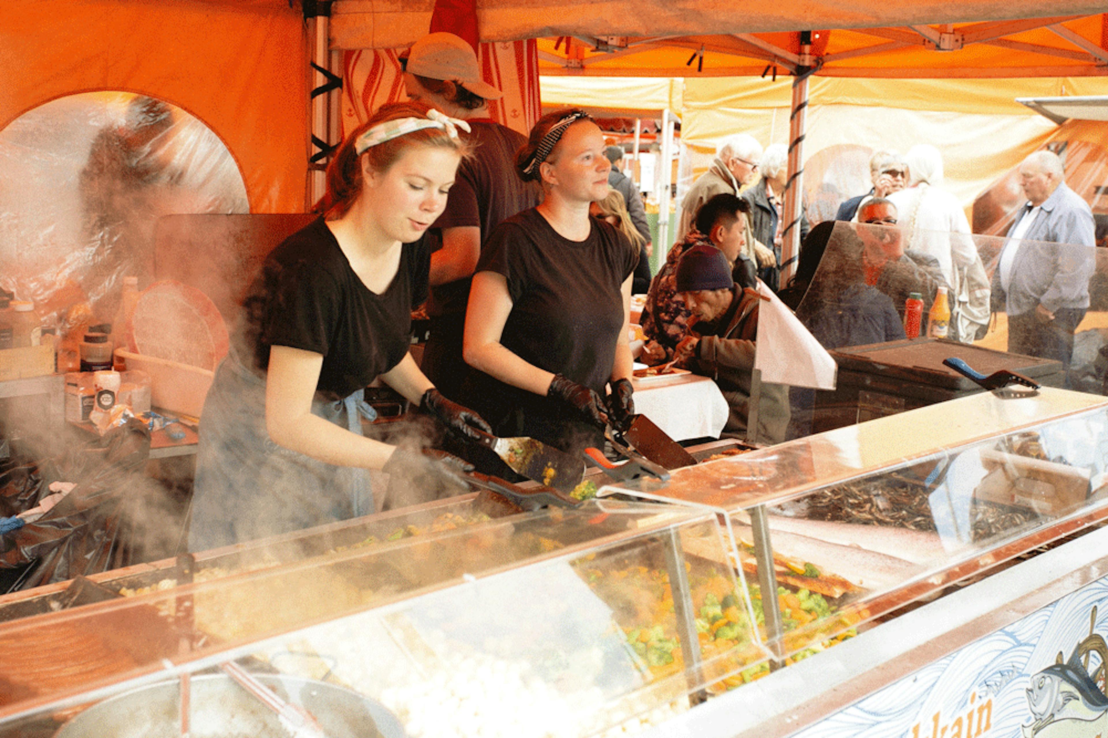 Image of women restaurant workers preparing food