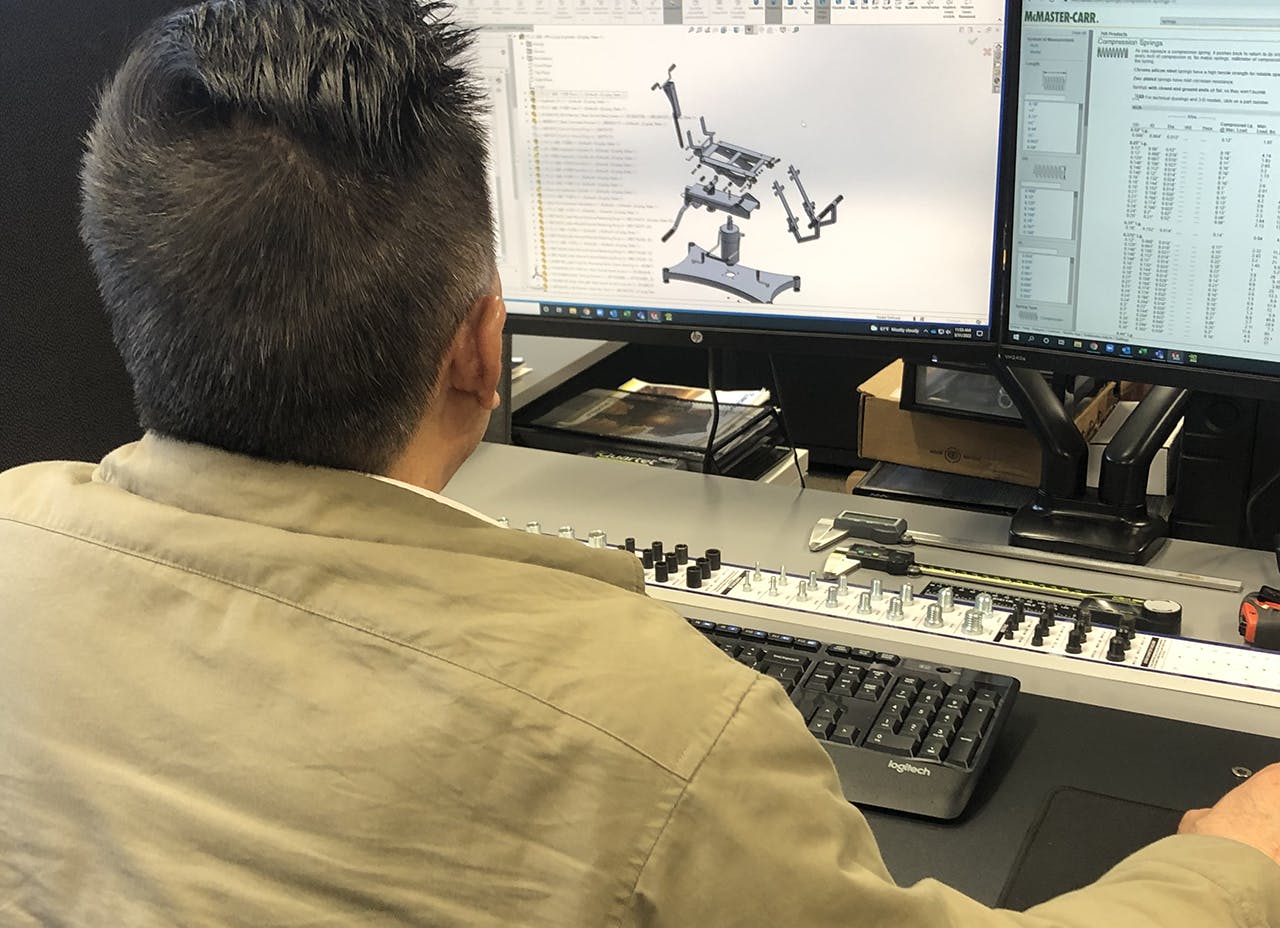 man working in front of computer