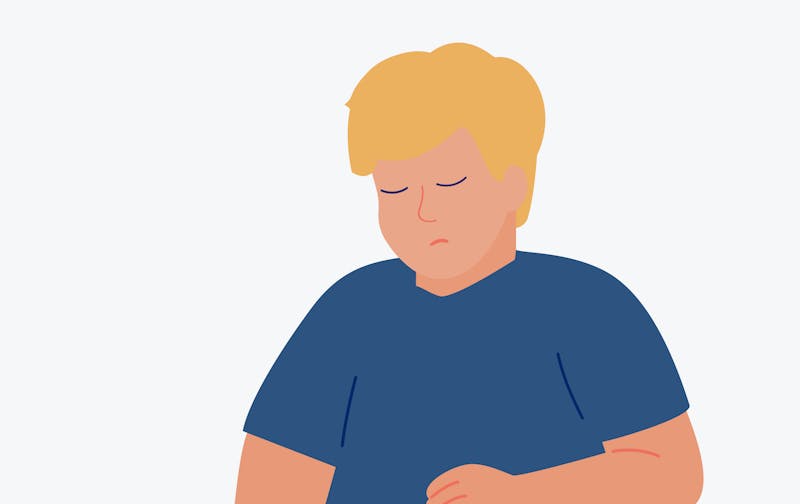 Manneskjan á myndinni er leið. Hún er ljóshærð og klædd í bláan stuttermabol. Hún er með lokuð augun og lítur niður til hægri.