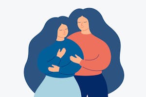 Kobieta pociesza inną kobietę.