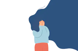 Manneskja heldur fyrir augun. Hún snýr að okkur og mikið liðað hár sveiflast til hægri í vindinum.