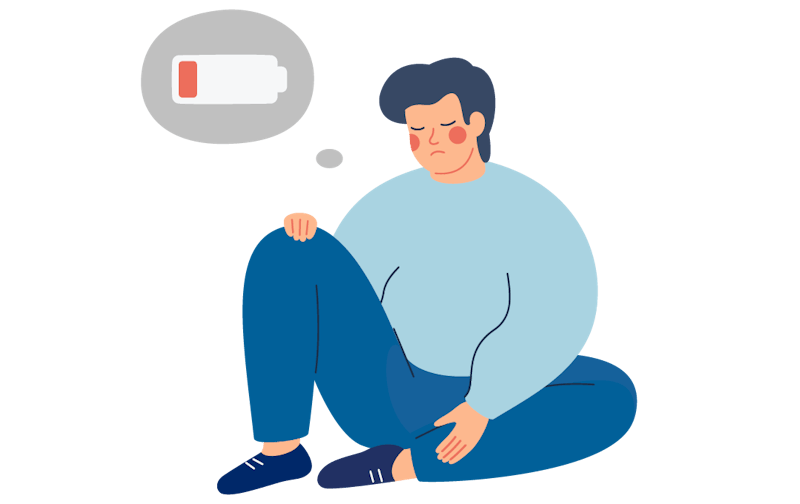 A man sits exhausted on the floor. A thought bubble shows an empty battery.