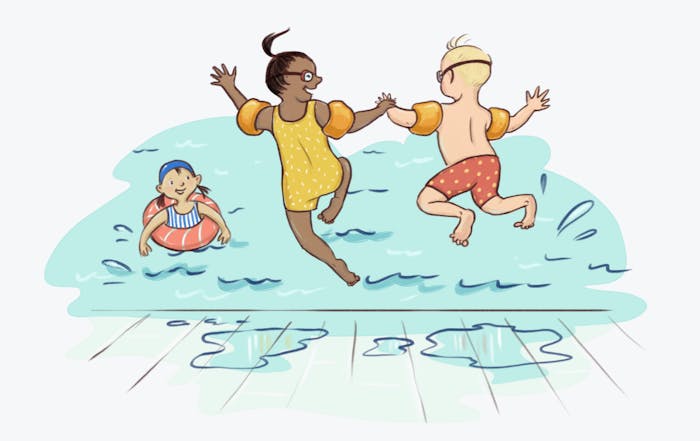 Happy children jumping into a pool.