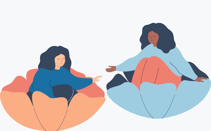 A woman offering support to another woman.