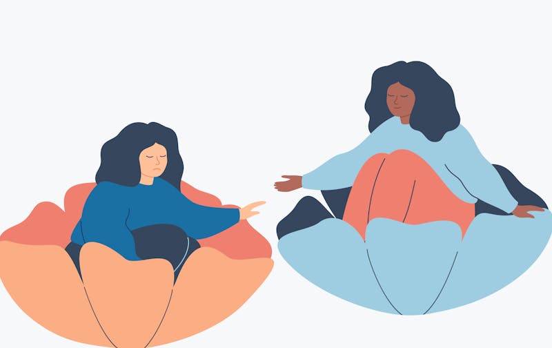 A woman offering support to another woman.