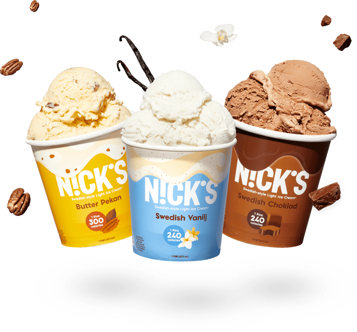 Three pints of N!cks ice-cream floating along with pieces of pecans, a vanilla flower, and chunks of chocolate