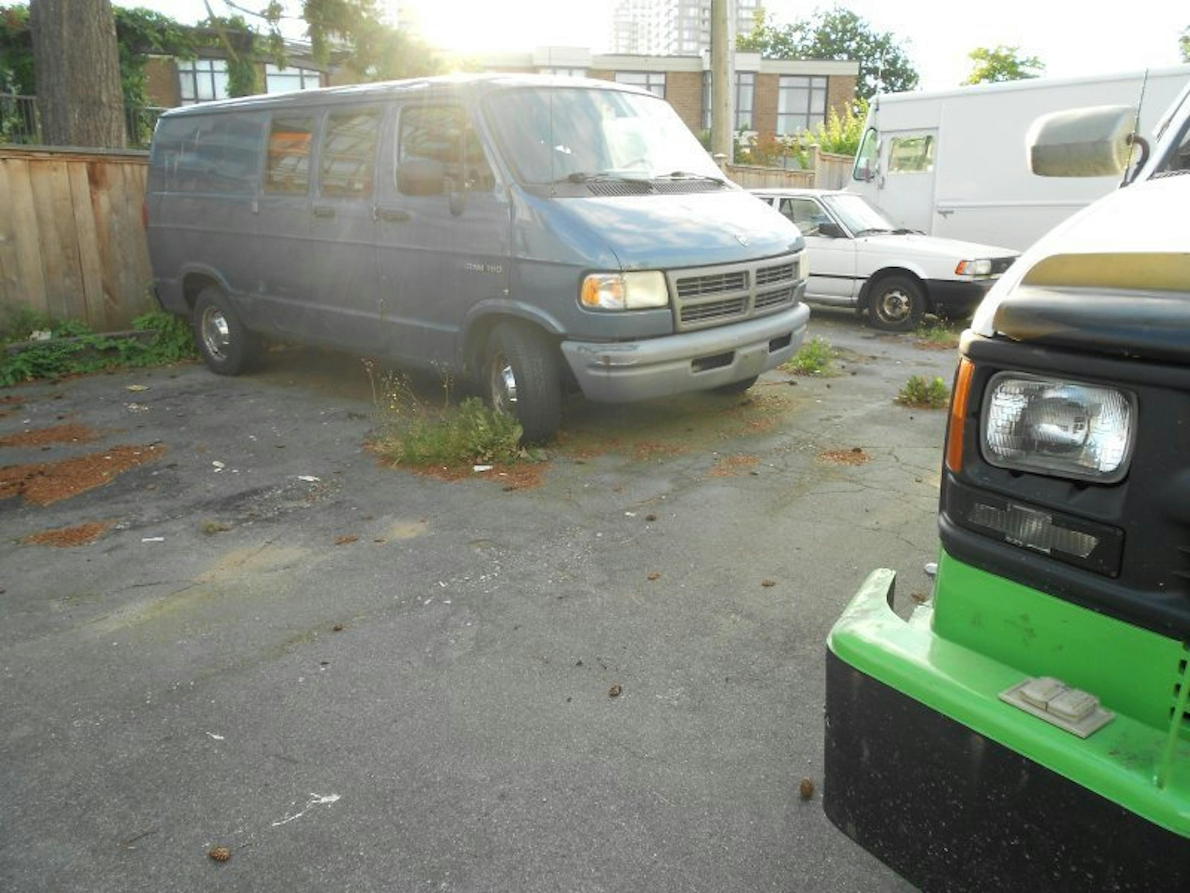 Nick's Auto Towing picking up a Dodge van.