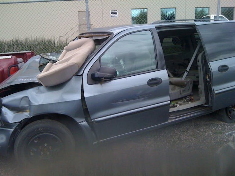 Nick's Auto Towing picking up a scrap van.