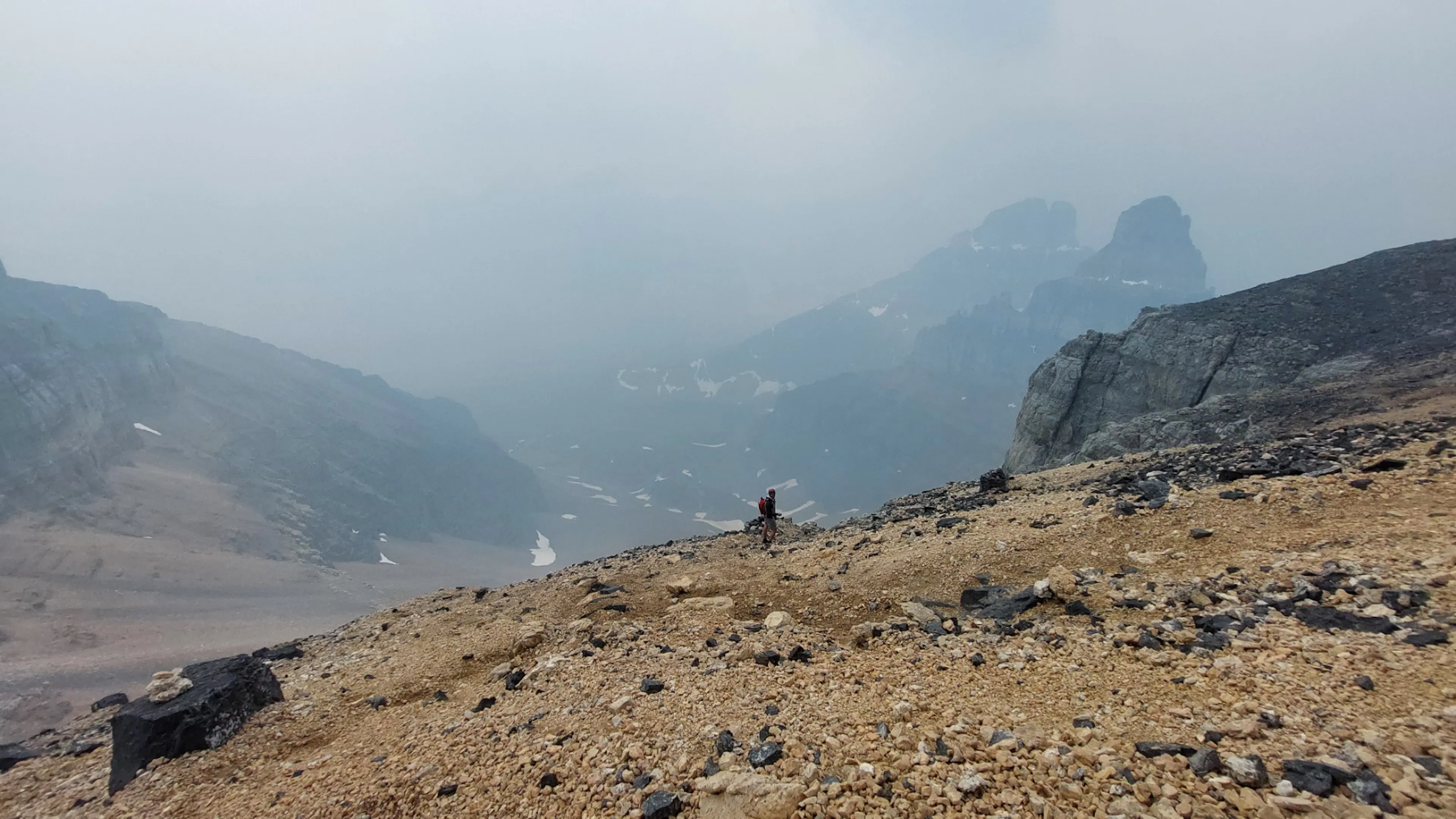 Photograph of a hiker on Mt Temple ridgeline