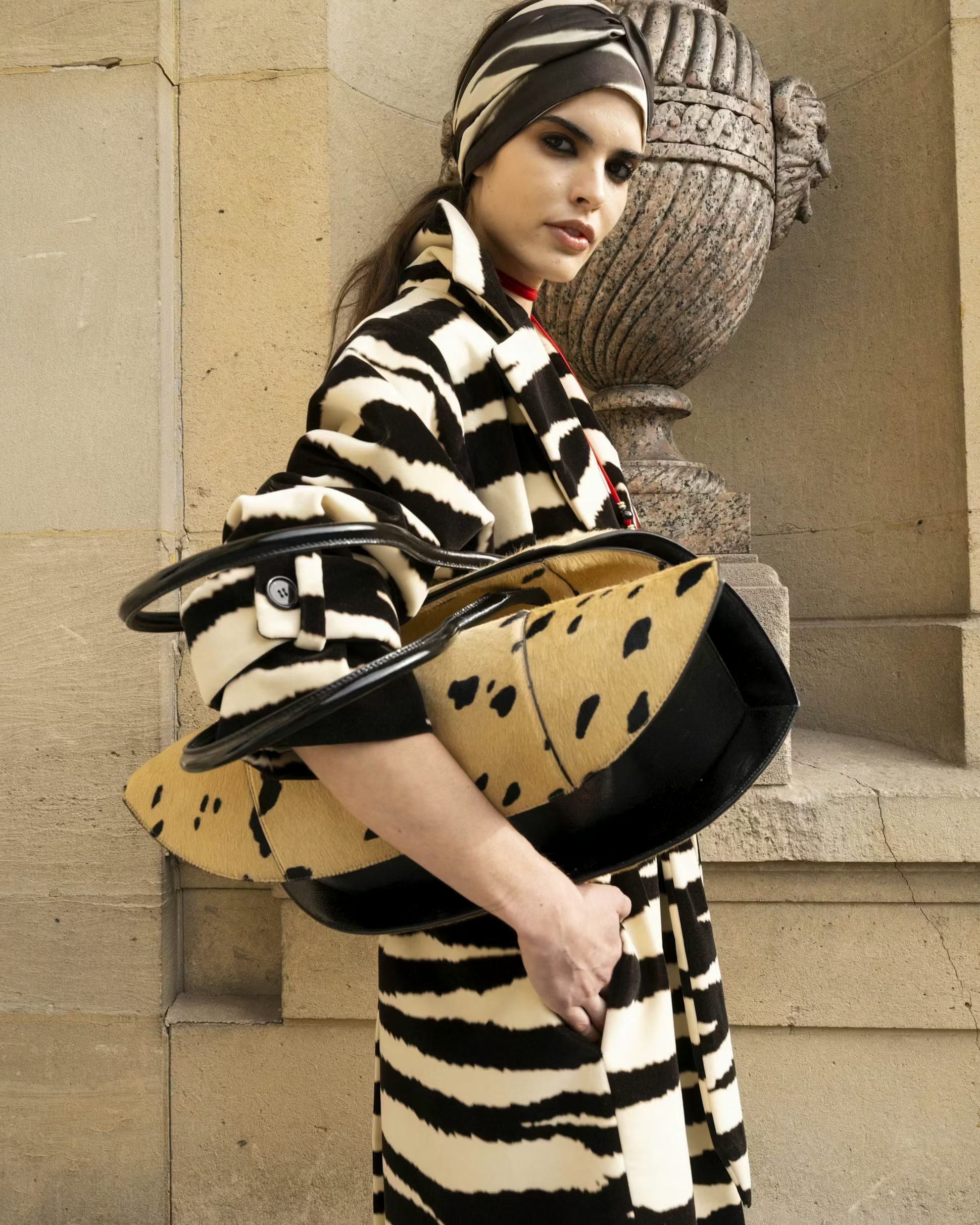 Model posing backstage at the Fall Winter 2025 show