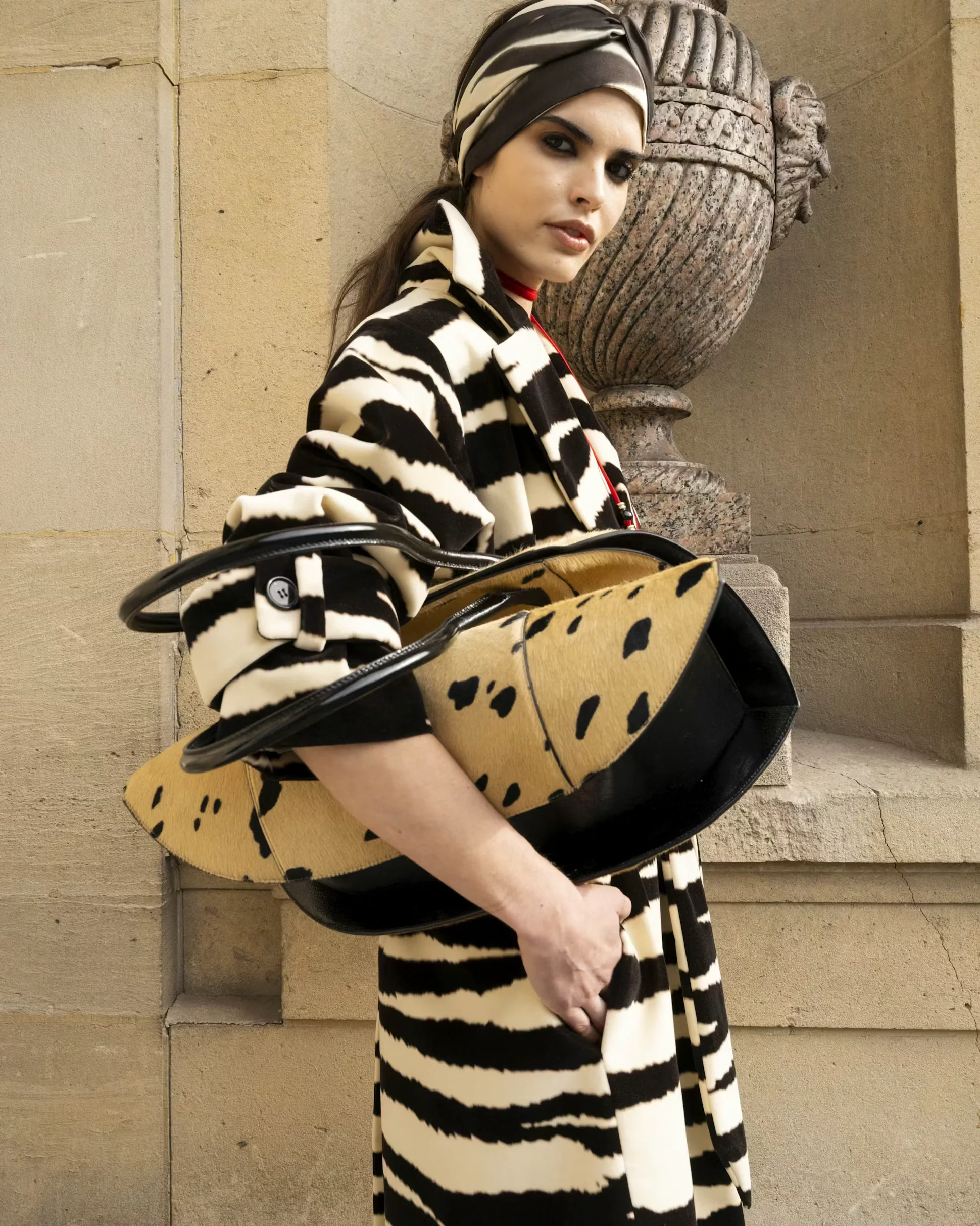 Model posing backstage at the Fall Winter 2025 show