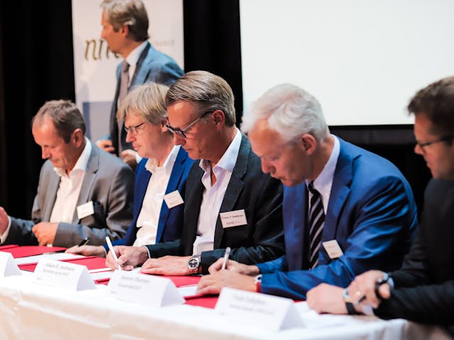 NMI celebrates 10-year anniversary with signing new, record-breaking fund