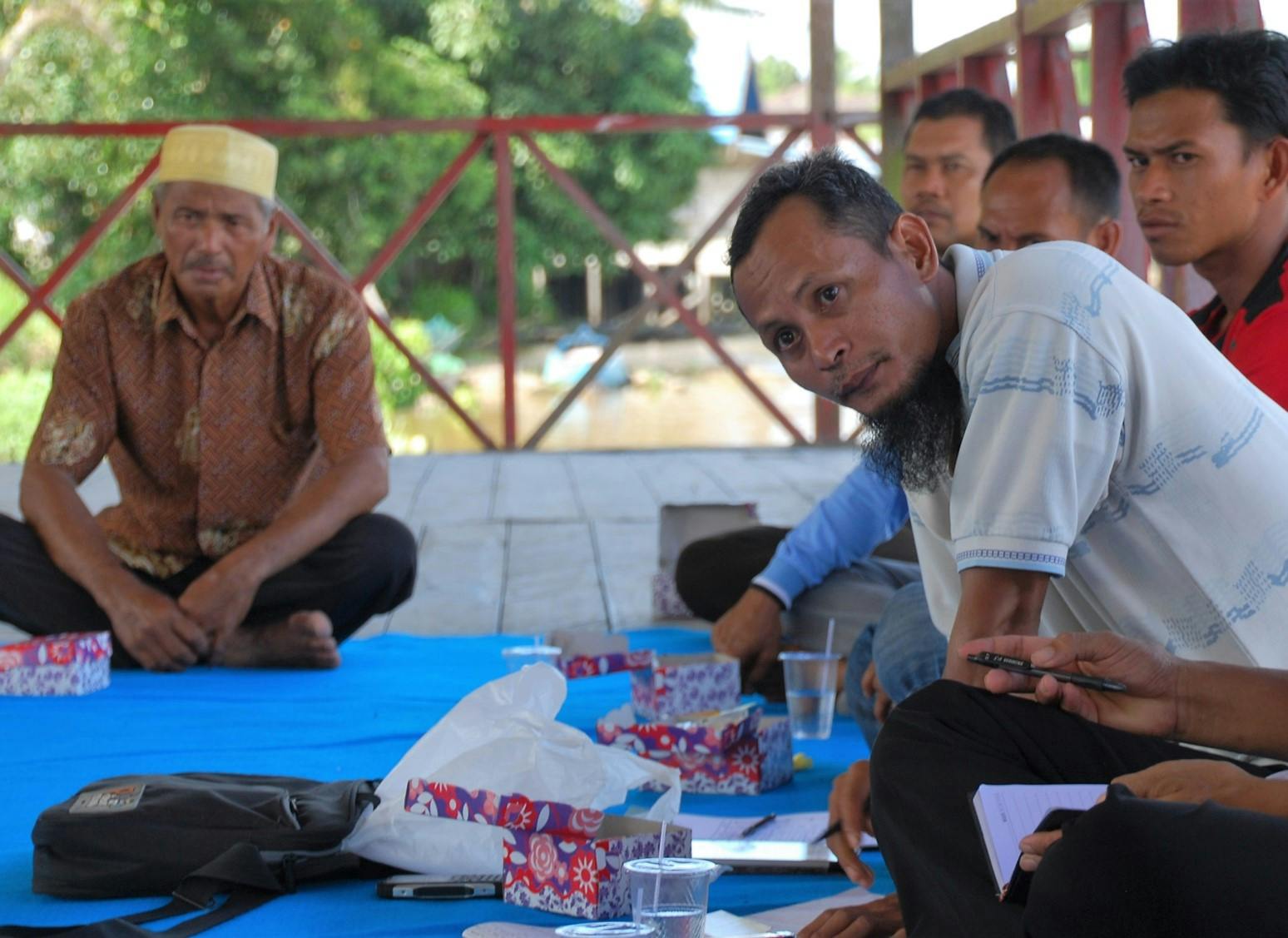 Men gathered for a meeting