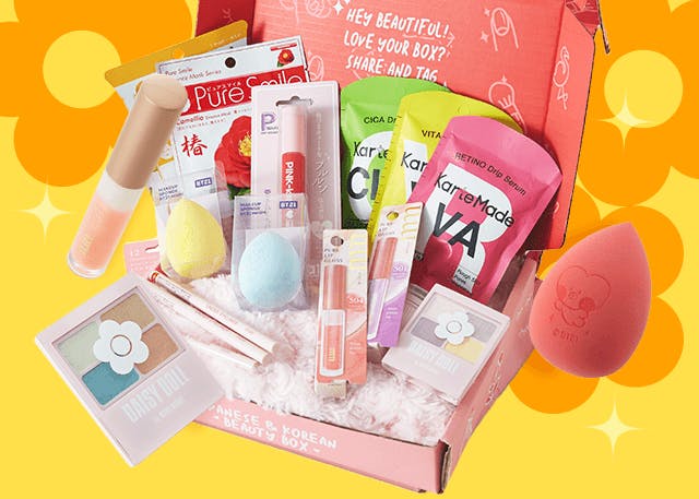 A picture of a nomakenolife box in front of a yellow background that shows that there are many more items inside for the Color Pop Pretty box. 
