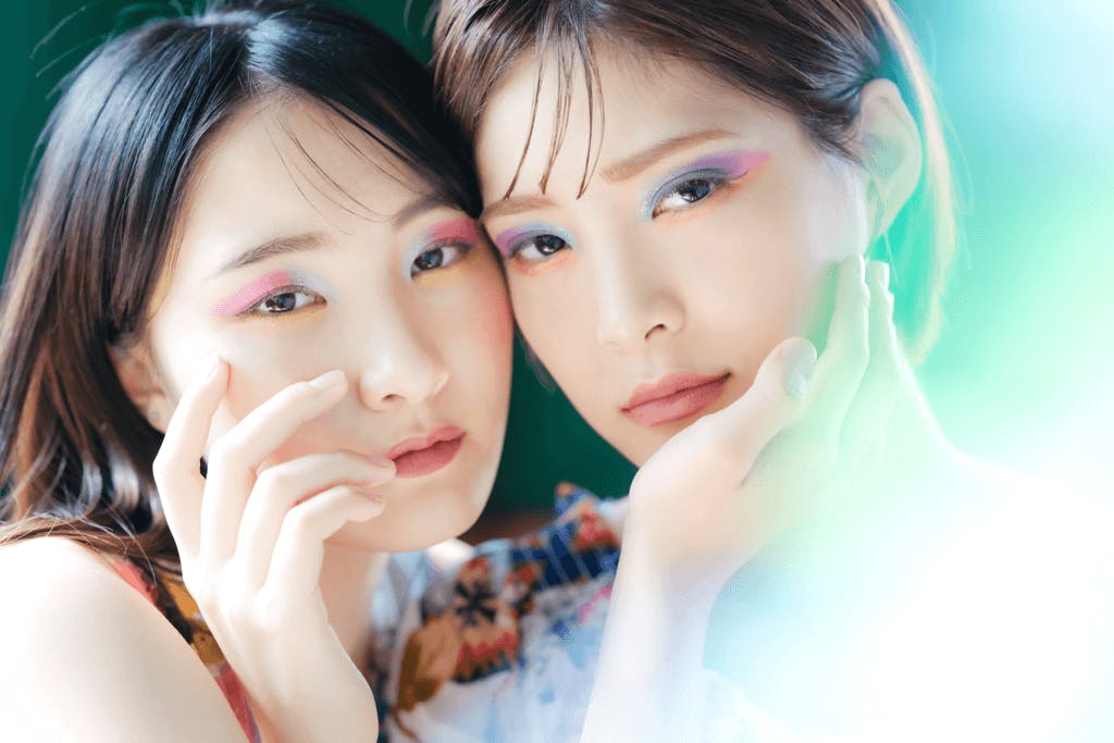 Two women with beautiful eye makeup made with makeup from one of the popular japanese cosmetics brands
