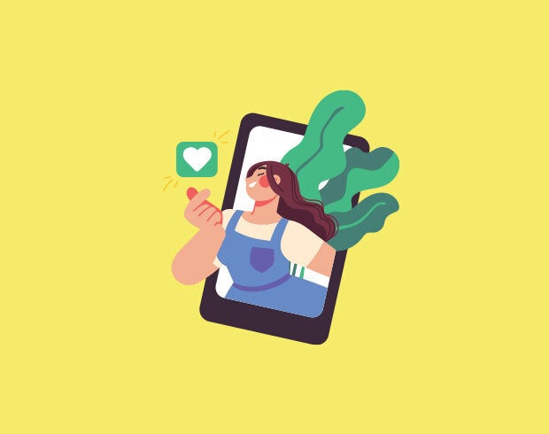 Cartoon woman points at a heart emoji, she is partially obscured by a phone screen which she appears to be climbing out of.