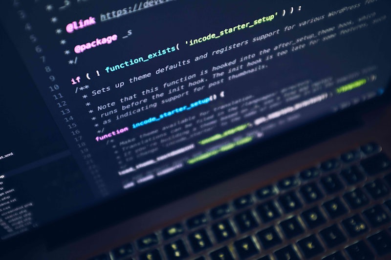coding on laptop