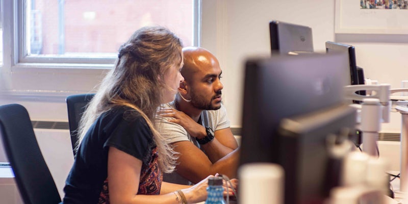 Northcoders pair programming in office