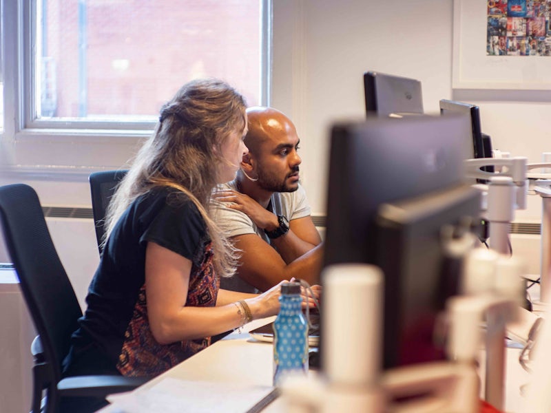 Northcoders pair programming in office
