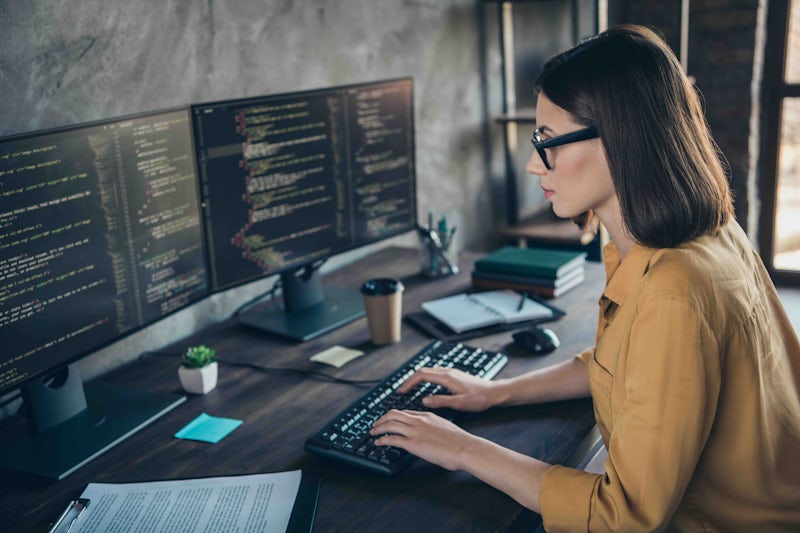 Female programmer working at home
