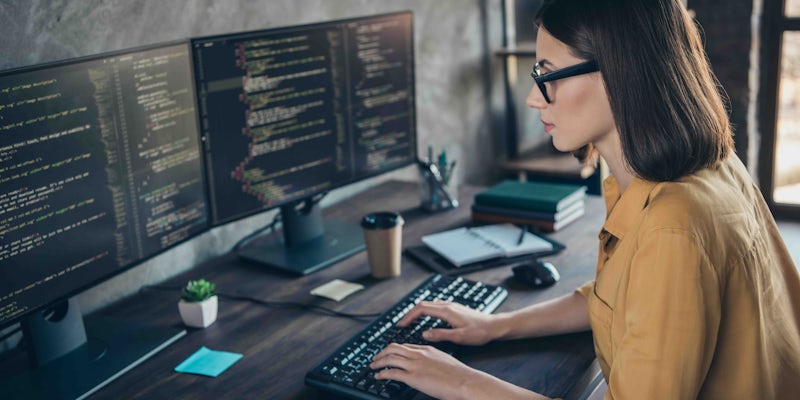 Female programmer working at home