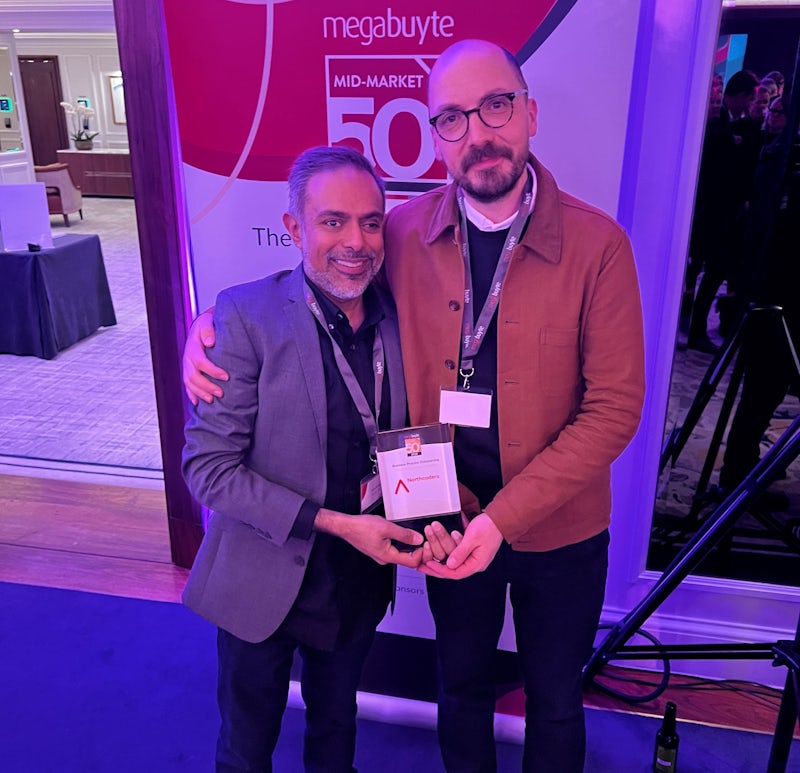 Amul Batra and Steven Oakes collect award