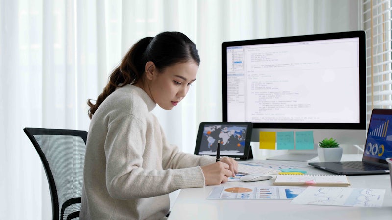 Female programmer working at home