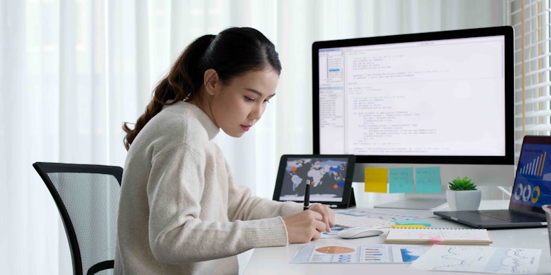 Female programmer working at home