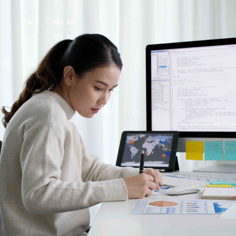 Female programmer working at home