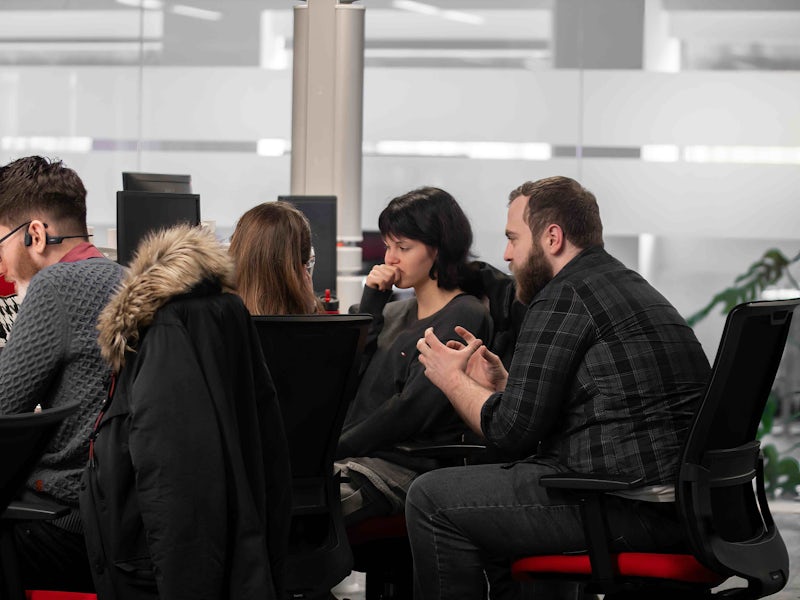 Group of Northcoders students with mentor