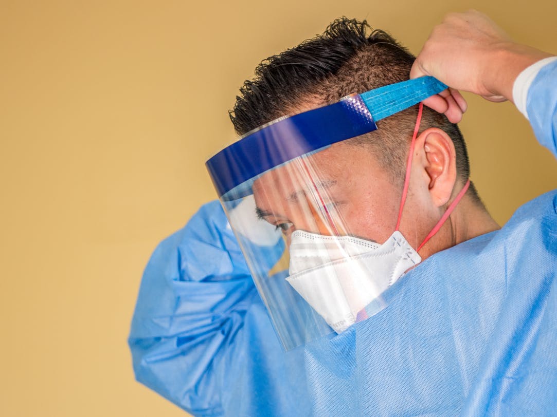 Man wearing face shield