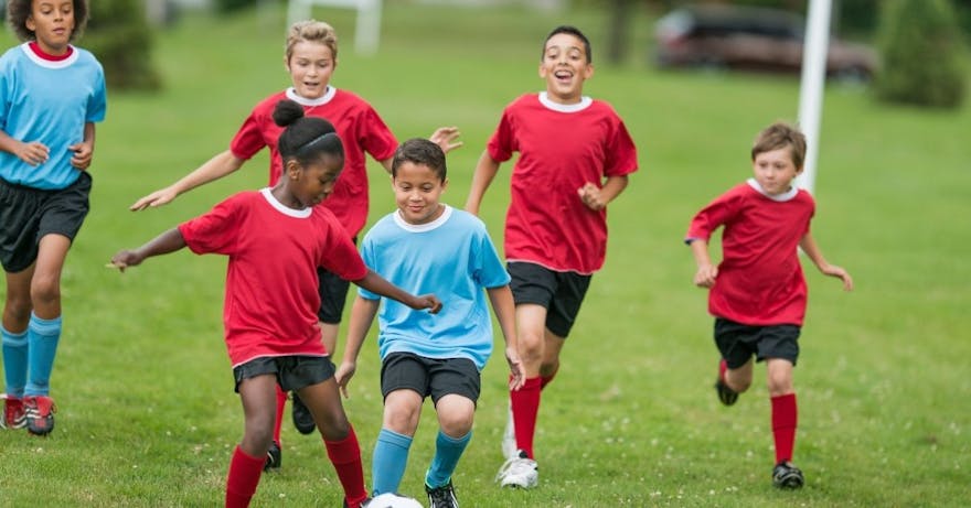 Kids Playing Soccer at Camp