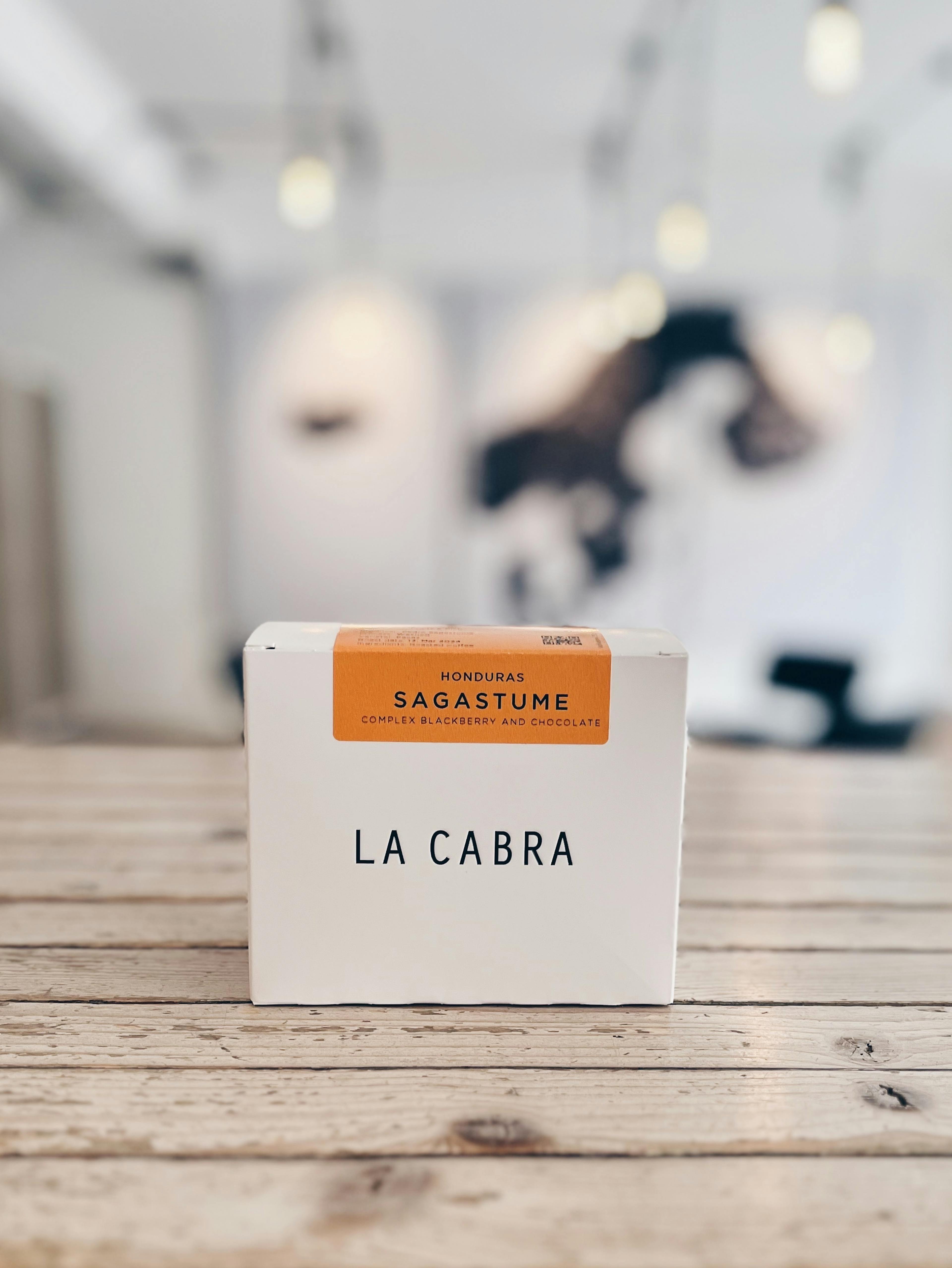 La Cabra coffee bag of specialty coffee on a counter.