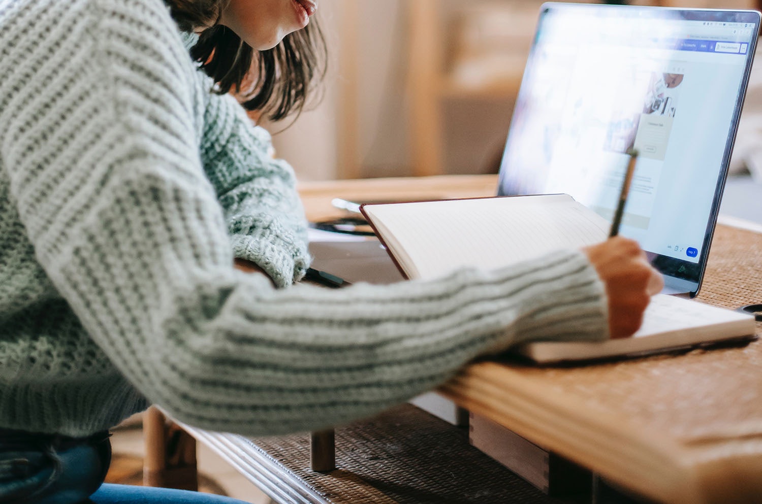 Young Woman Writing Website Content