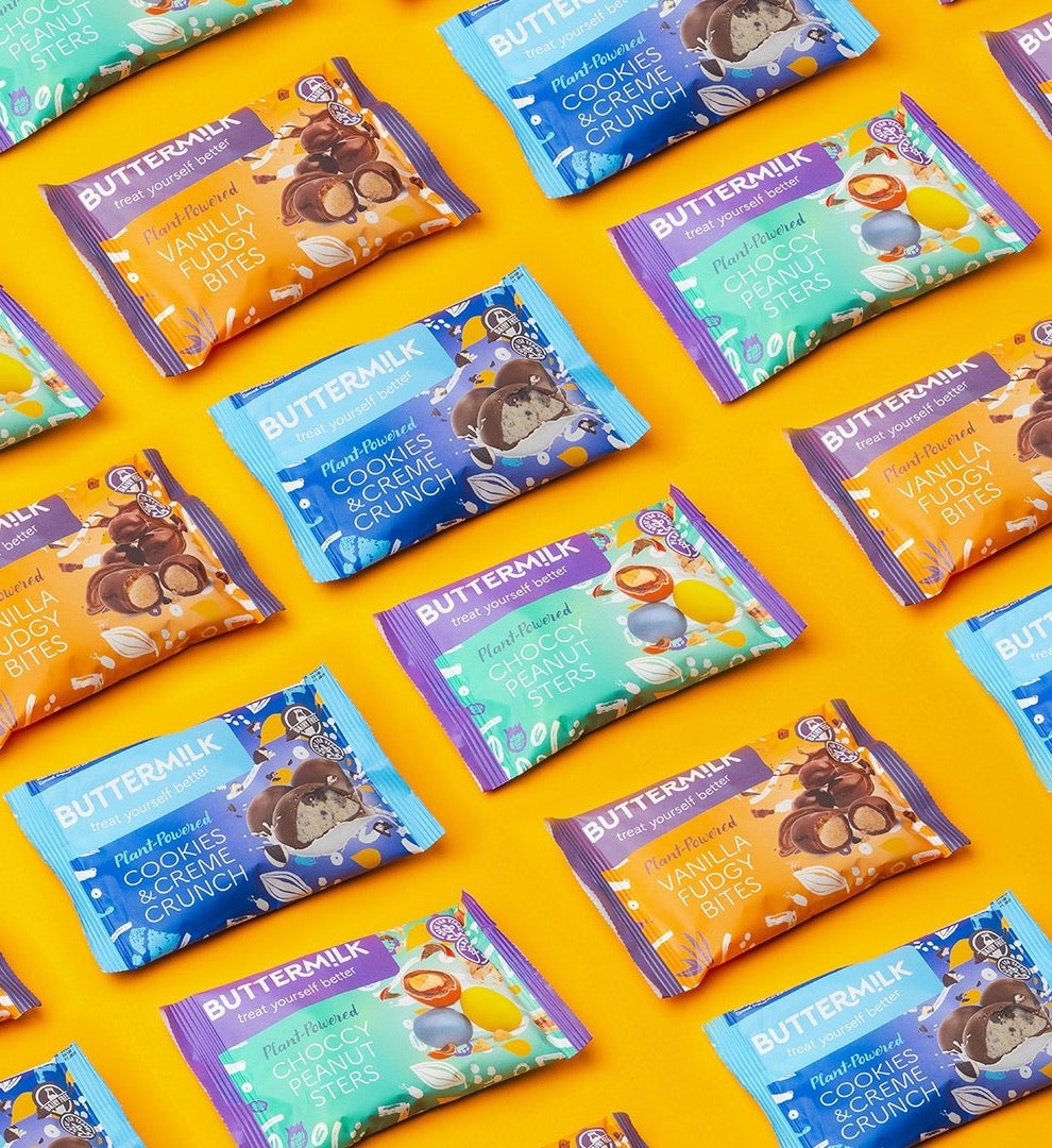 Lots of products by Buttermilk Confectionery on a bright orange background.