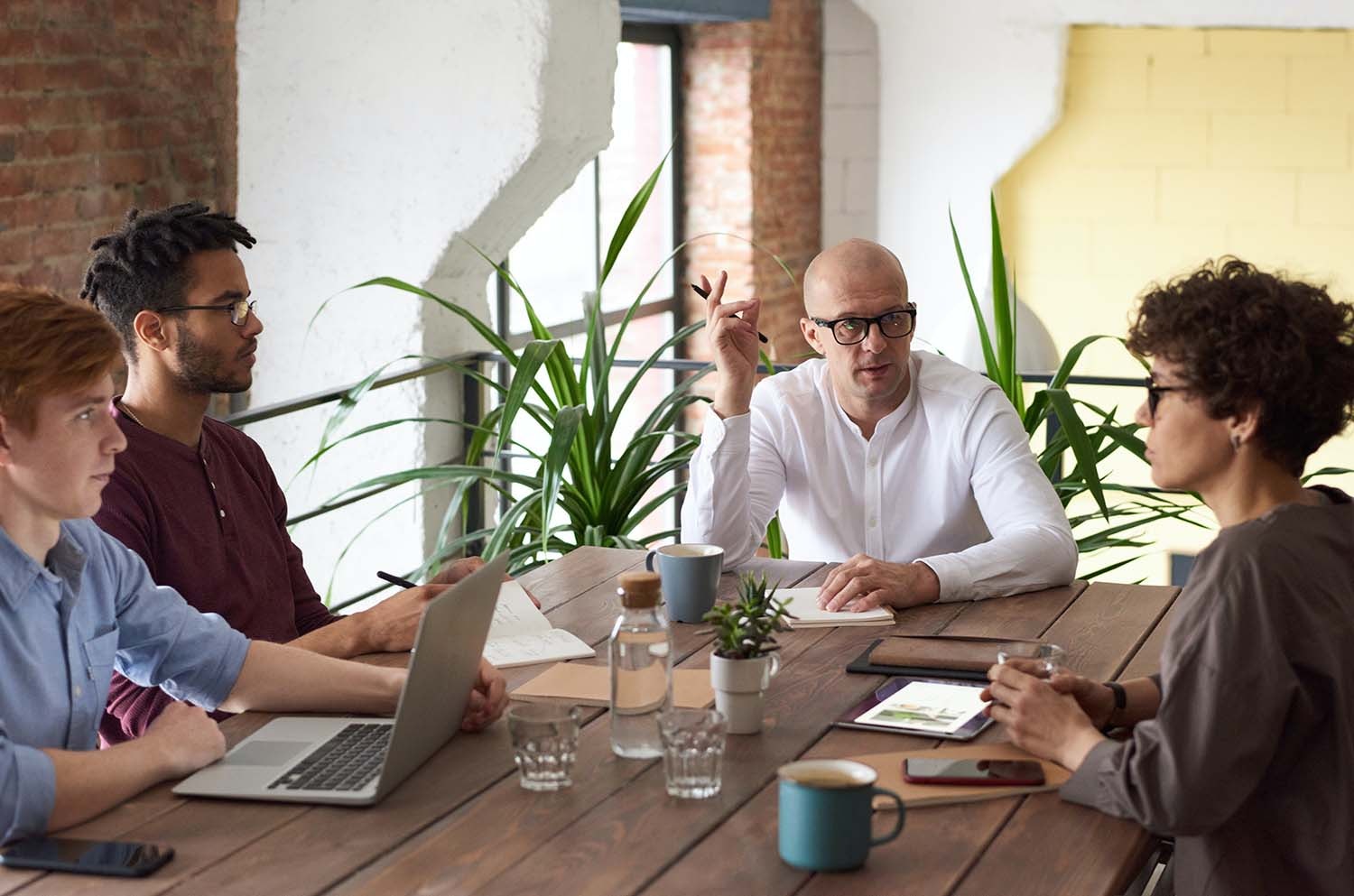 Agency Workers Talking Around a Table