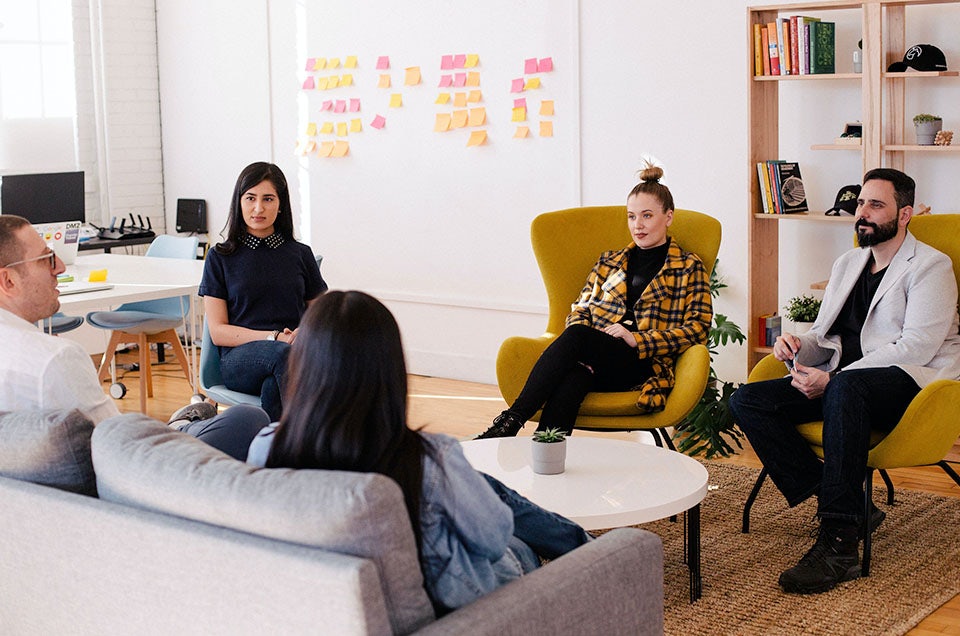 A small agency team having a meeting