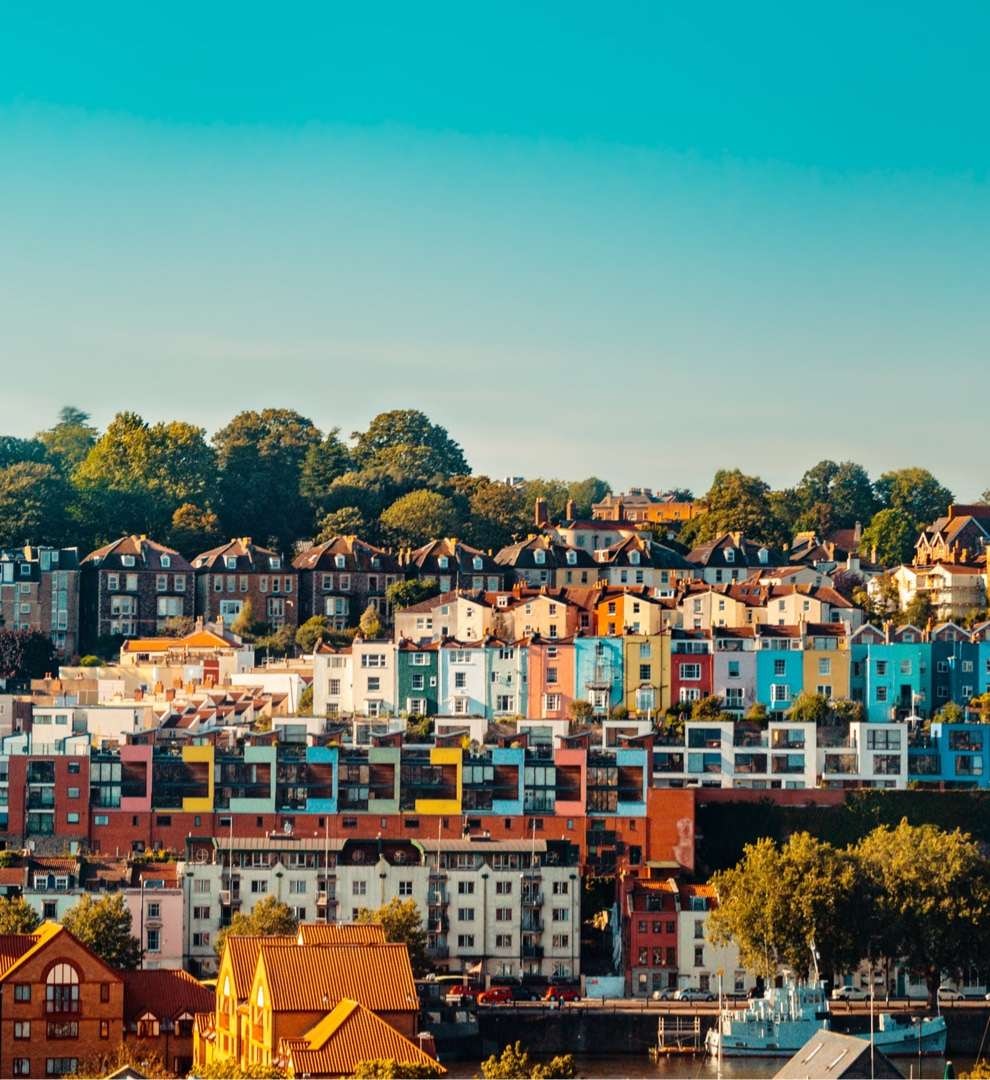 Hero image of the Contact page. Landscape image of the colourful houses in Hotwells, Bristol.
