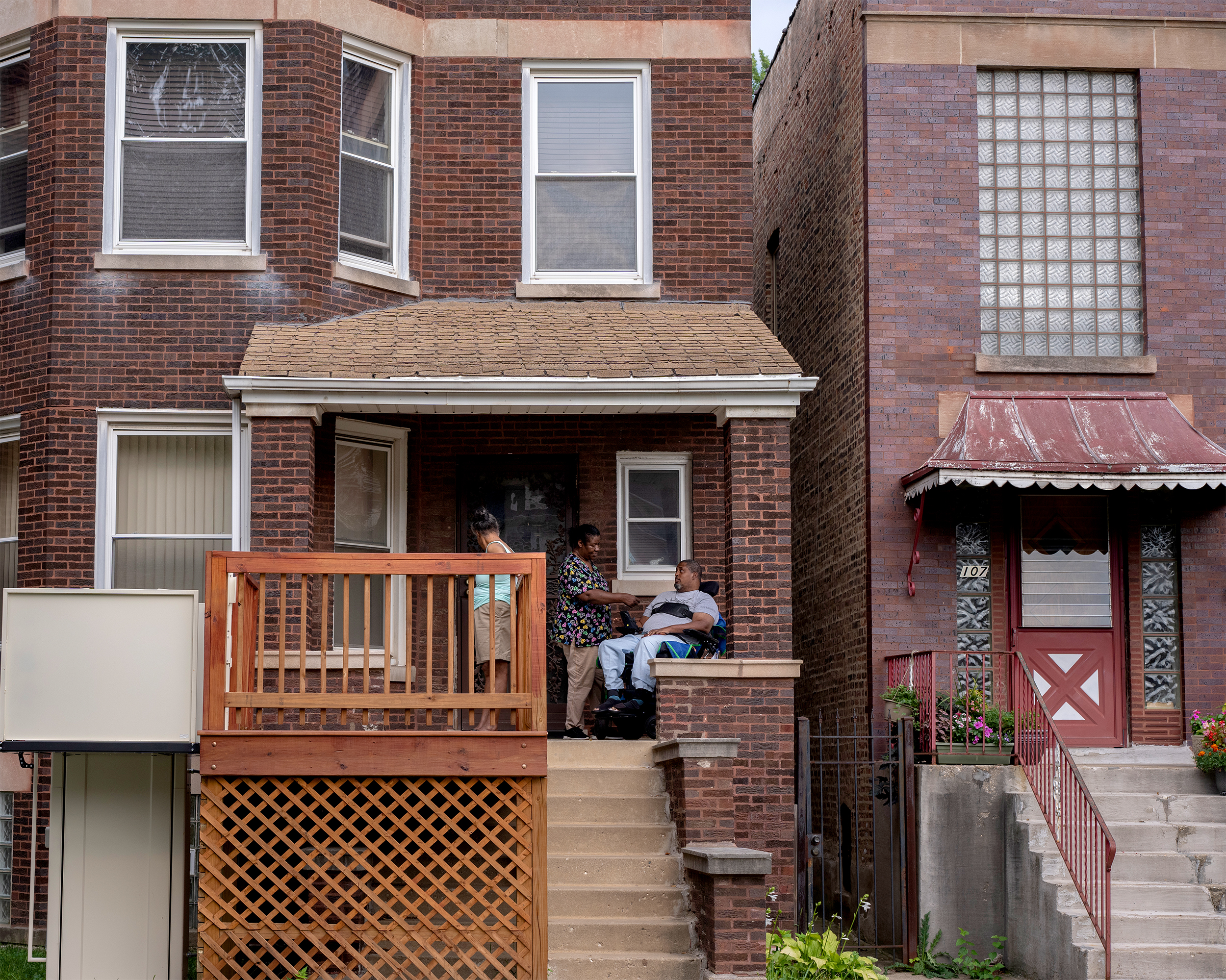 Marcus Kelley on the front porch of his house