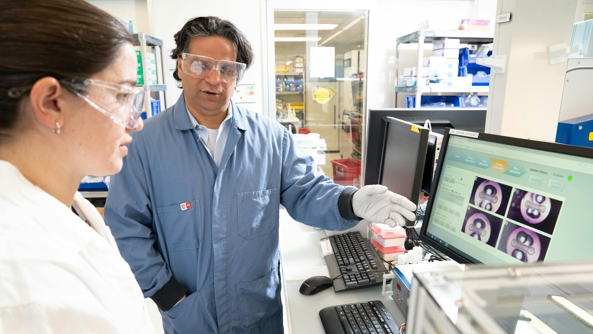 Vipender Singh and Savannah Moore in the lab.