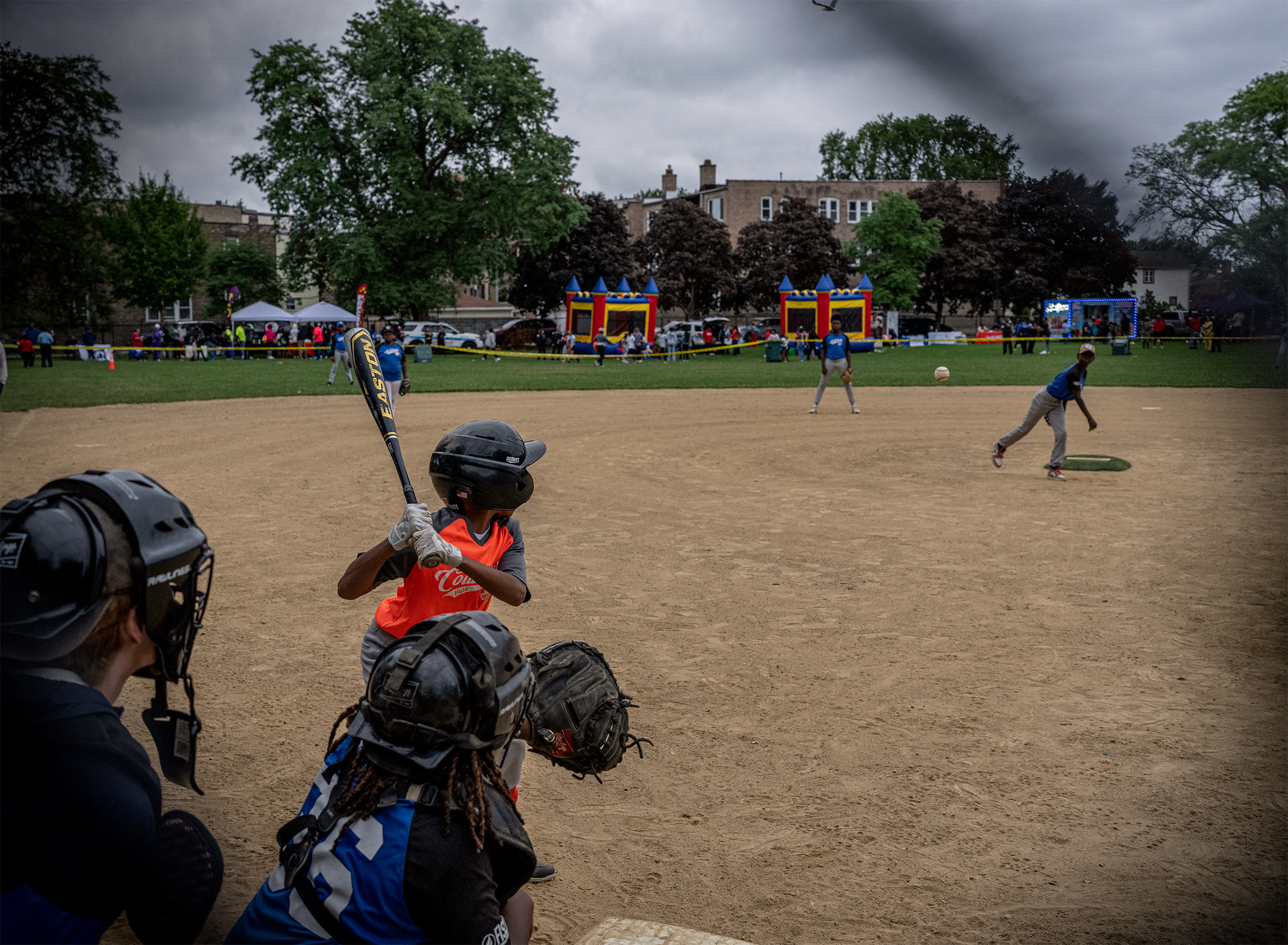 Boys playing baseball in Moore Park