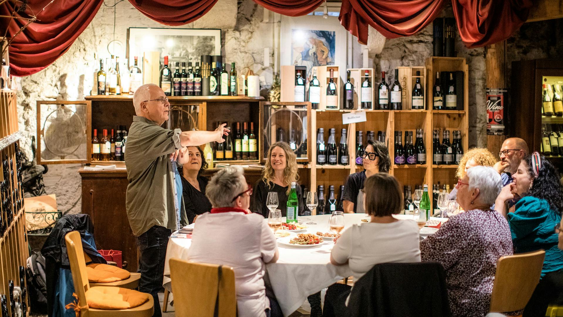 Martin Duerr talking to a group of mainly women.