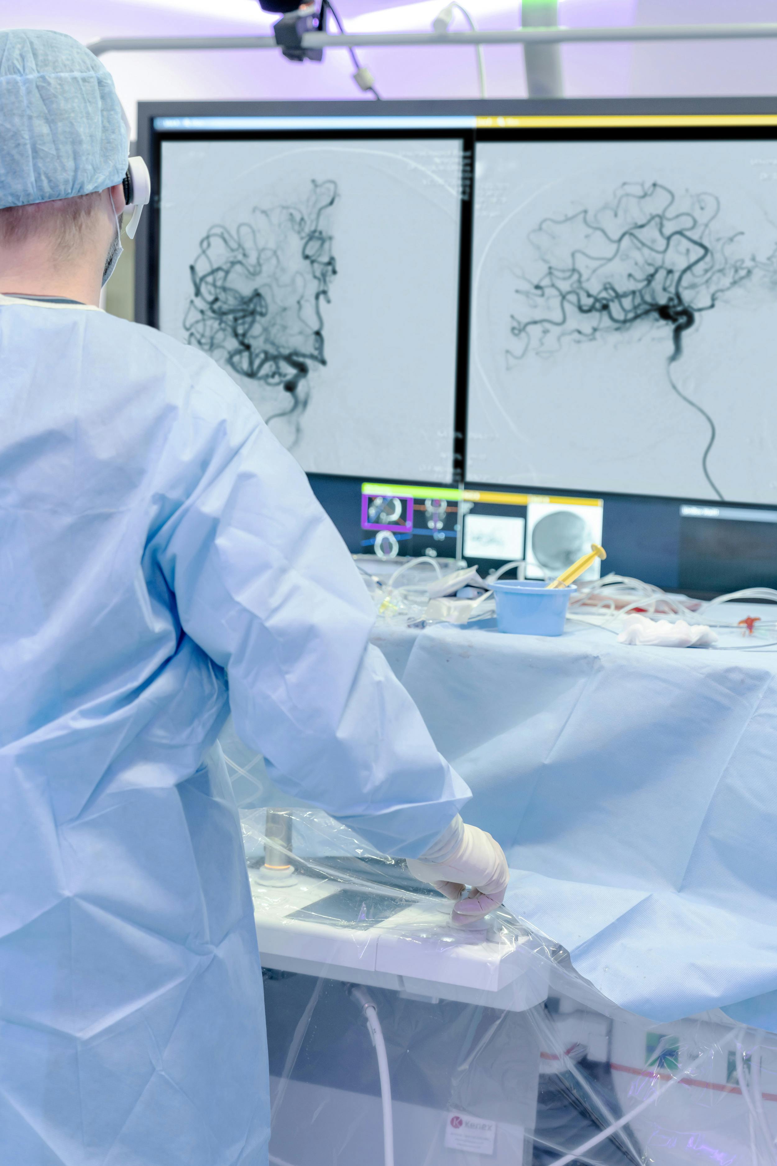 Psychogios stands in the operating theater treating a stroke patient